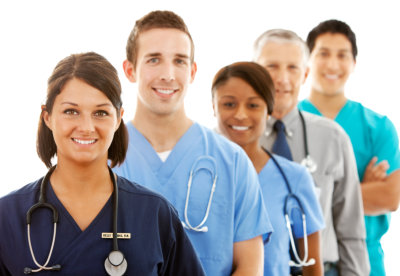 group of doctors, physicians, and nurses smiling